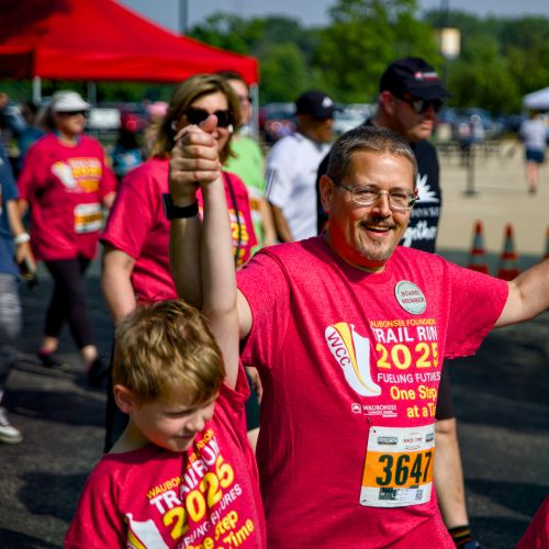 one adult two children, from the community participating in Waubonsee Foundation Annual Trail Race Fundraiser
