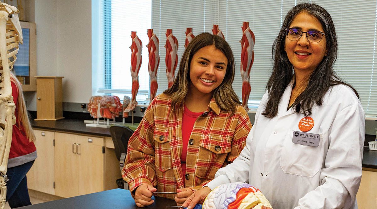 Professor of Biology Dr. Sheela Vemu with student in class 