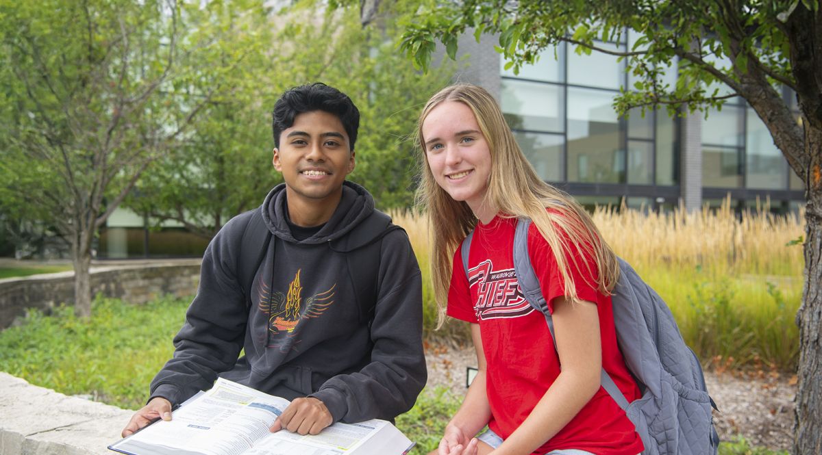 Two students outside campus