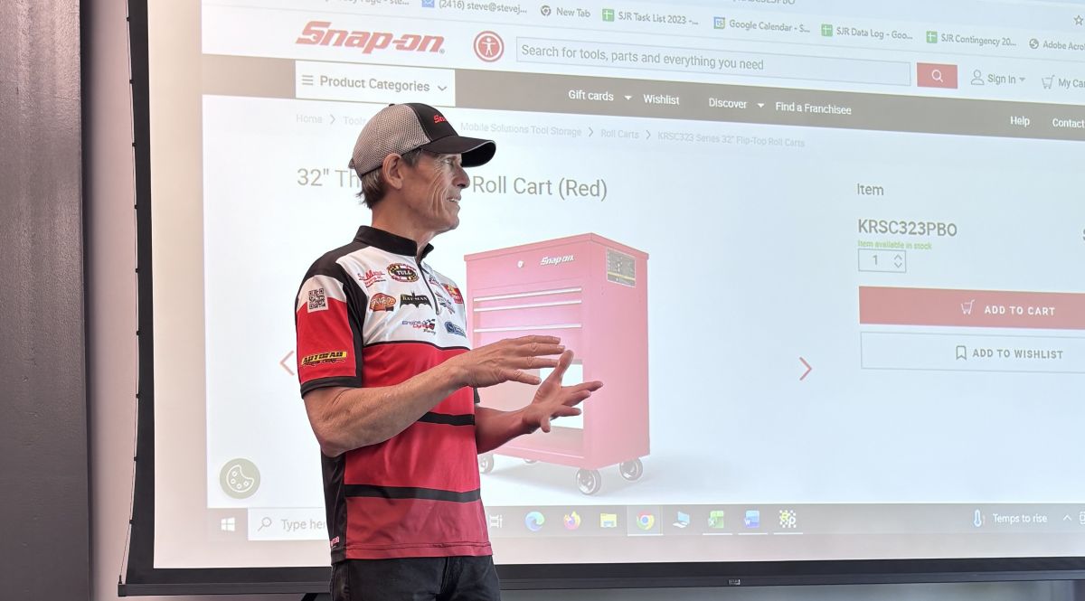 NHRA Professional Racer and team owner Steve Johnson visited with Waubonsee Community College automotive students and presented five students with the "Be a Technician" (Bat-man) national scholarship.
