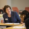 Dr. Sobek smiles with student