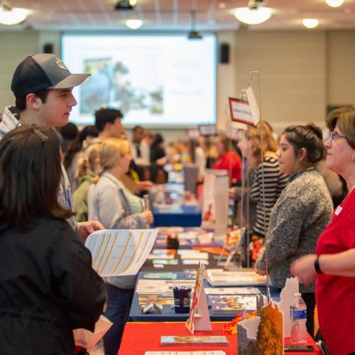 students meeting with college reps