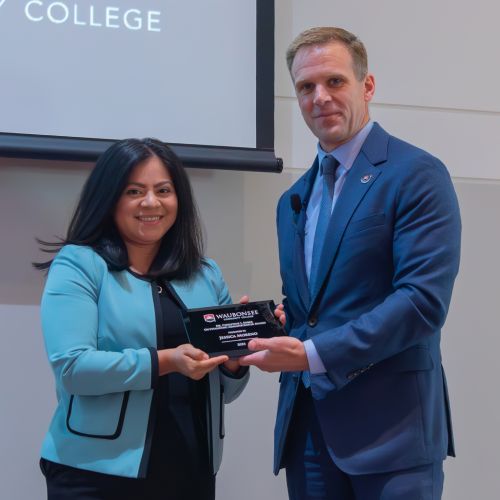 Jessican Moreno receives 2023 Outstanding Administrator Award from Dr. Knetl