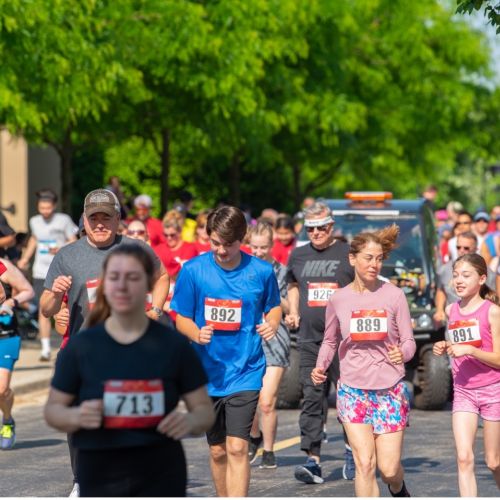 Foundation Trail Race Participants of all ages walk and run in Waubonsee’s 2023 5K/10K.