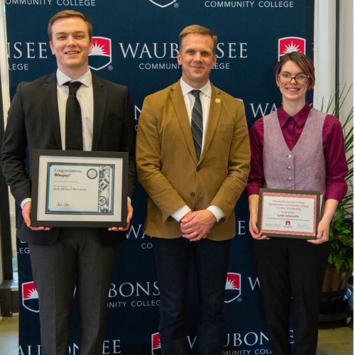 Jack McGreevy and Lucie Jumonville, pictured with Dr. Brian Knetl