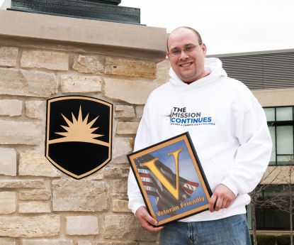 Waubonsee’s Veterans Club President Matthew Wolding received a President’s Volunteer Service Award from President Barack Obama.