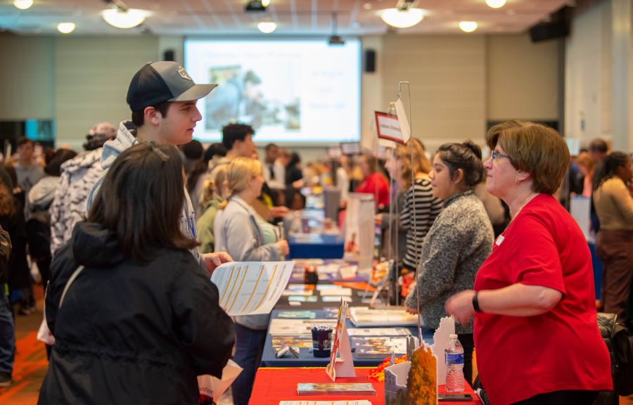 students meeting with college reps